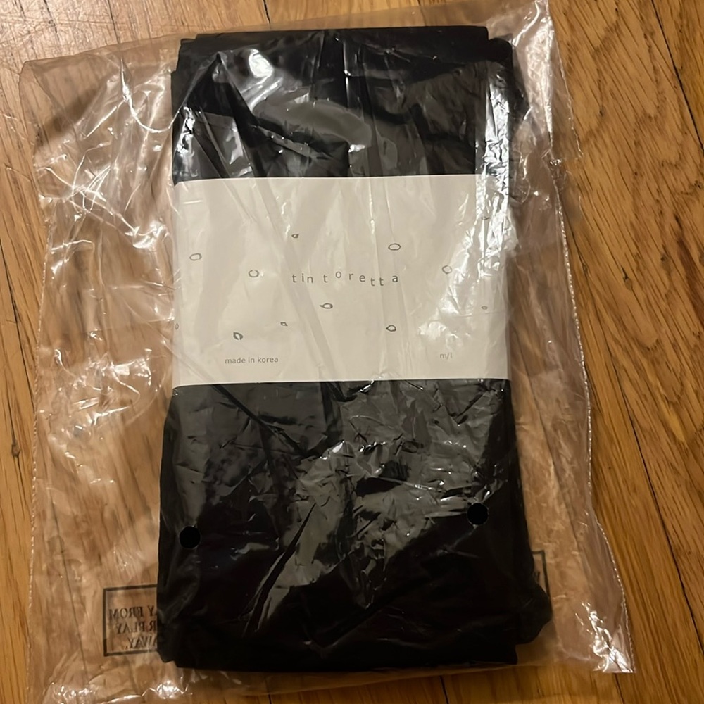 Anthropologie Tintoretta black tights size M/L